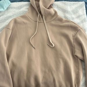 Love never fails tan sweatshirt